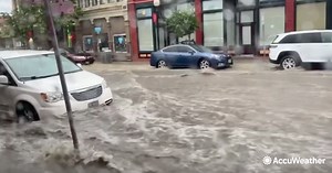 Floodwaters race through Montana city and leave damage behind