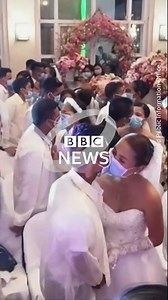 220 couples tied the knot at an annual government-sponsored mass wedding ceremony in the Philippines. But due to the threat of coronavirus many couples shared a kiss through a face mask. bbc.in/2SS4mMw | BBC News