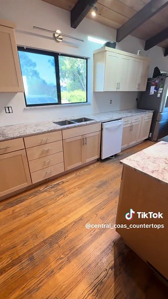 White Spring Granite kitchen countertops — expertly crafted for timeless elegance and durability. Elevate your kitchen with premium quality and flawless finish. #centralcoastcountertops #BathroomCountertops #GraniteCountertops #QuartzCountertops #MarbleCountertops