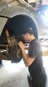 How to replace a Wheel bearing on a 2004 ford ranger: Part 1: Caliper Bracket & Rotor #mechanic