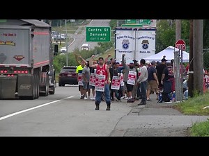 Trash piles up across Massachusetts on day 2 of waste collectors strike