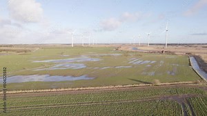 Denmark Countryside and Wet Wild Landscape And Green Energy With Wind Turbine - Aerial