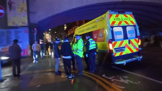 Person taken to hospital after fight in pub in Manchester City centre#police#ambulance#nightlife