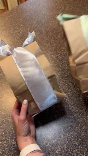 9.8K views · 51 reactions | 331_Let’s dress up those boring brown bags shall we! #giftwrappingideas #giftwrappinghacks #giftwrappingtutorial #Christmas #wrappingpaper #wrappingpresents #wrappinghacks #foryouシ #foryouシpage | Wrappinqueen | Facebook