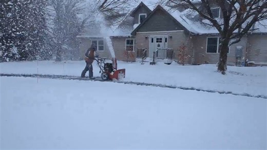 Heavy snow cleared on Thanksgiving morning in Cadillac, Michigan, USA