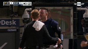 Luis Torrens leaves game with an apparent injury