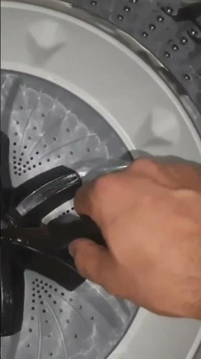 The easiest way to disassemble the washing machine fan and clean underneath it