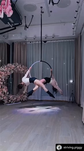 Aerial Hoop Tricks on Instagram: "💞 @striving.piggy @aerial.yuen #aerialhooptricks"