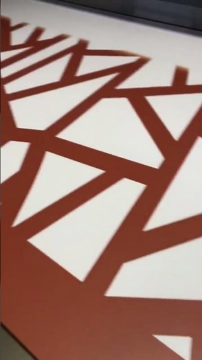 The video shows the process of UV printing on aluminum composite panel.