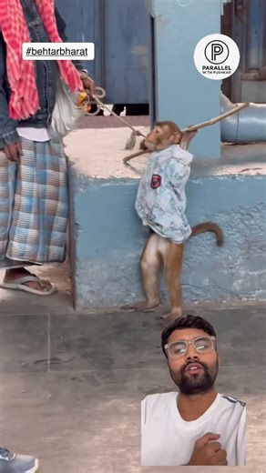 Parallelwithpushkar on Instagram: "Today I came across a 22-year-old bond… a monkey and the man who has raised him since he was a tiny baby. The story truly touched me. When this monkey was very young, he was almost dying. At that time, this man’s father rescued him, adopted him, and gave him a new life. Since then—22 long years—they’ve been living like a family. In the video, the monkey looks happy, playful, and full of life. But one thing made me think… He still wears a chain around his neck. 