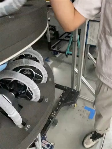 Car factory: steering wheel installation