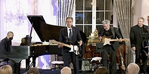 US Secretary of State covers "Hoochie Coochie Man"on guitar at State Department function