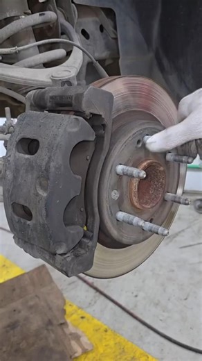 gmc yukon front brake service install new brake pads #shortsfeed #automobile #mechanic