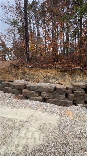 Halfway done with the retaining wall. How do you think it will look? It will be about 4’ taller. #redrivergorge #retainingwall #outcropping #bigrocks #designbuild #cabin #newconstruction #customcabin #excavation #cabindesign | Mountain Building Co - Red River Gorge | Facebook