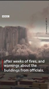 The moment part of Beirut's port grain silos collapsed has been caught on camera, following recent fires and warnings from officials. The buildings were badly damaged in the 2020 port explosion, which killed more than 200 people - with the second anniversary of the disaster approaching next week. https://bbc.in/3QaK2jY | BBC News