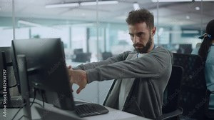 Authentic Office: Enthusiastic White IT Programmer Starts Working on Desktop Computer. Male Website Developer, Software Engineer Developing App, Video Game. Terminal with Coding Programming Language