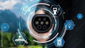 Focus EV charger pointing in front of camera display eco-friendly energy infrastructure icon pictogram hologram with blur natural background. Alternative clean energy for no CO2 emission EV car.Peruse