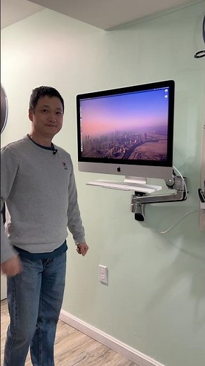 The floating iMac with Ergotron wall mounted monitor arm.