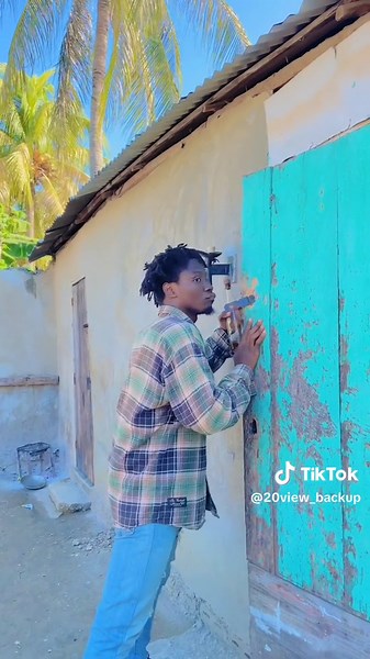 Exploring a Rustic Door in a Tropical Setting