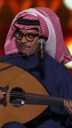 Rabeh Sager's Captivating Oud Performance in Traditional Attire