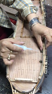 Adding metal details on the deck of our fully assembled HMS Surprise Replica, bringing the spirit of the sea to life with every gleaming adornment. ⚓🔩 #HMSsurprise #Replica #NauticalCraftsmanship Available at: https://omhusa.com/catalog/t191-hms-surprise-tall-ship-model #hmssurprise Replica #Craftsmanship #ModelShip #craft #art #modelboat #modelshipbuilding #craft #modelship #woodword #modelboatbuilding #modelboatbuilder #handmade #handcraftedshoes #HMSsurprise #HMSsurprisemodel | Ship Model