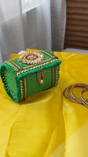291K views · 100 reactions | “ Embrace the festive vibes of Hariyali Teej with this DIY bangle keeping box!  Perfect for gifting or keeping your own bangles safe, I crafted this eco-friendly and traditional piece using cardboard, fabric in the gorgeous green hue of Teej, and adorned it with elegant golden laces. ✨ Celebrate the spirit of Teej with this handmade beauty!  . . . . #diy #diydecor #teej #festivedecor #easydiy #banglebox | Indu Sharma | Facebook