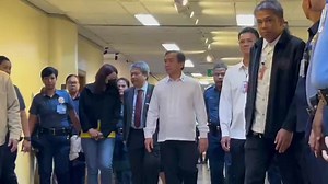 Ex-Mayor Alice Guo is now inside the committee room to attend the Senate investigation into the illegal POGO operations in Bamban. Guo is escorted by her legal counsel, Stephen David. | via Hana Bordey/GMA Integrated News