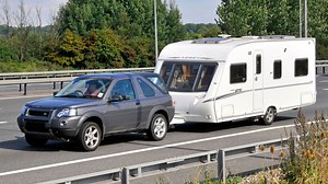 Rules on passengers riding in a caravan when it is being towed