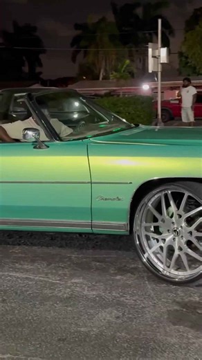 2Fly in his Chevy after winning the Donk race