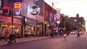 WS Acrobat jumping in Beale Street, Memphis, Tennessee, USA