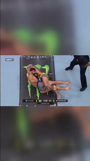 Charles Oliveira locks up a deadly guillotine choke early in Round 1