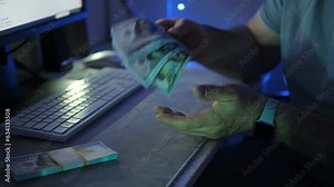 Close up of employee hands counting savings cash in the office. Man counting dollars. Business man banker takes out counts banknotes financial salary bribe and puts in an envelope Closeup