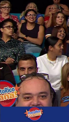A surprise volunteer joins the audience challenge!