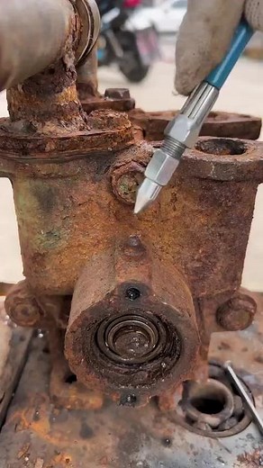 Restoring a Rusted Metal Component in the Workshop