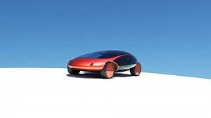 Model of a concept sports car driving past the camera.