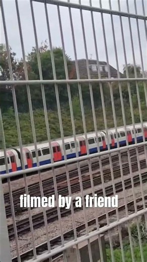 Picadilly line 1973 TS leaves Acton Town