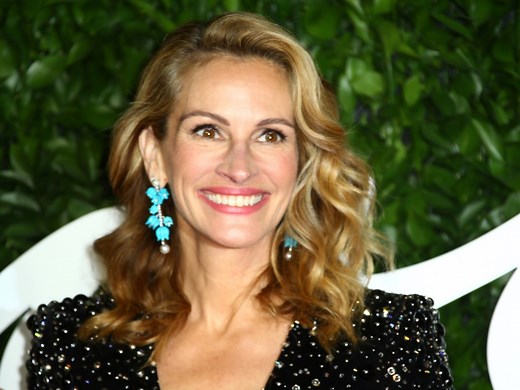 Julia Roberts Had a Seriously Stunning Beach Day in This Eye-Catching Hot Pink Swimsuit