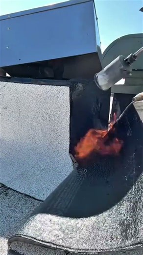 This worker burns the adhesive catalyst coating membrane and wall fasteners for installation #shorts