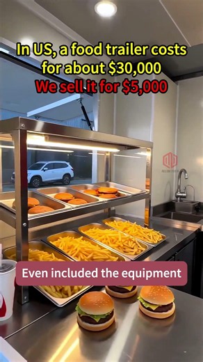 A custom 13-foot-long food trailer, specifically designed for street food vendors.