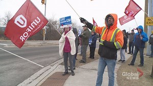 Whitby auto workers walk off the job, protest Oshawa GM plant closure