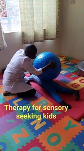 6.8K views · 146 reactions | Autistic kids come with different obsessions. Some are sensory aversive while others are sensory seeking like through frequent hugs. One way of managing sensory seeking is by using a spiked gym ball. This is a simple exercise that you can do at home as shown. | Don Orione Centre Kaburugi | Facebook