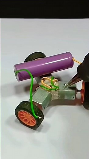 How to make a mini super fast bey blade car using by DC motors switch #battery #eloctronic #shorts