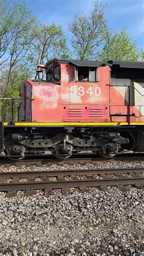 CN 5340 returns with the ACF CENTER FLOW 3-bay covered hopper at Vicksburg, MI