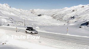 Bring your skis! Thule Flow is a low-profile roof box with aerodynamic design, perfect for the winter sport enthusiast. | Thule