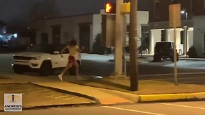 A man dressed as Forrest Gump is running down University Boulevard in downtown Tuscaloosa after Alabama's national championship win. | Alabama Crimson Tide on AL.com