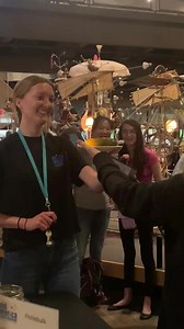 Have you ever seen a pickle glow?? How does it work? The salt found in pickles is sodium chloride, NaCl. Electricity at 120 volts is powerful enough to split the NaCl apart into Na and Cl-. It then strips the extra electron from the sodium atom producing a photon of yellow-orange light, which is the glow that you see! Thanks for a great day at 2023 Tesla Fest! See you next year!! | Mid-America Science Museum