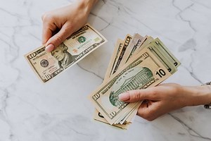 8 Spiritual Meanings of Finding Money on the Ground