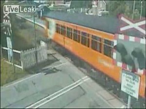 Another amazing near miss at a train crossing.