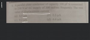 A parallel plate condenser of capacity 100 pF is connectedto 2... | Filo