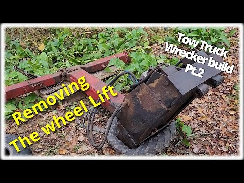 How to repair a tow truck wheel lift